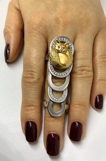 Двойное золотое кольцо бренда Schone с бриллиантам