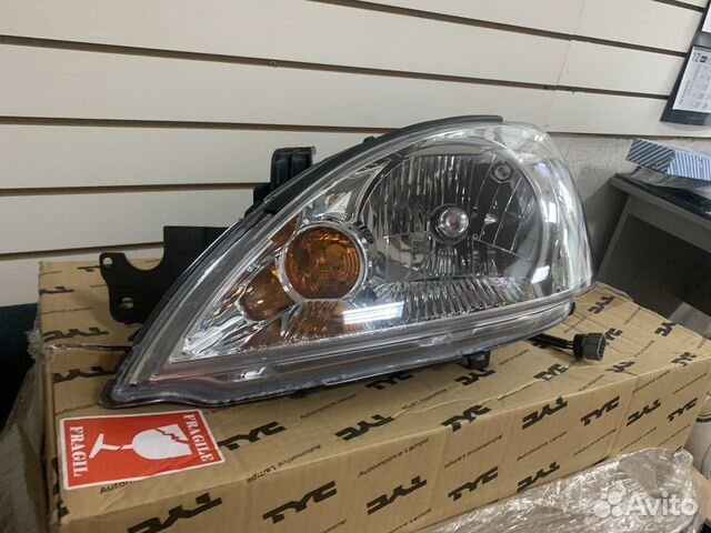 Фара левая Mitsubishi Lancer 9 2003-2008