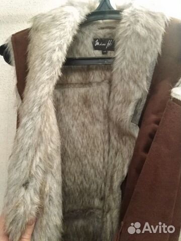 Меховая жилетка