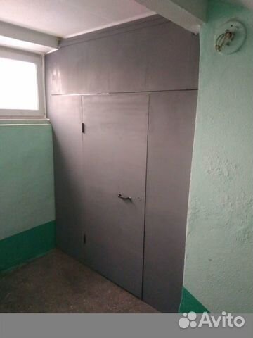Кладовка металлическая с дверью между этажами