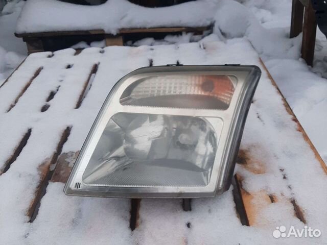 Фара левая Форд Турнео Коннект оригинал