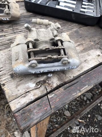 Суппорт задний левый Chery Tiggo t11