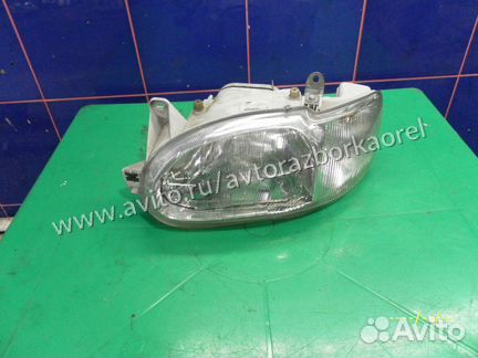 Фара левая Ford Escort