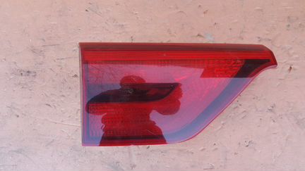 Фонарь в крышку багажника задний левый Kia