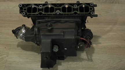 Коллектор впускной Opel Astra J (A16XER)